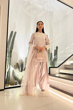 Kiran Malik's look