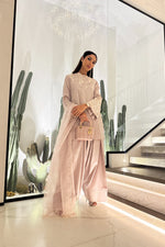 Kiran Malik's look