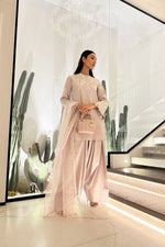Kiran Malik's look