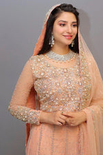 Ramsha Khan in Coral embellished Angarkha.
